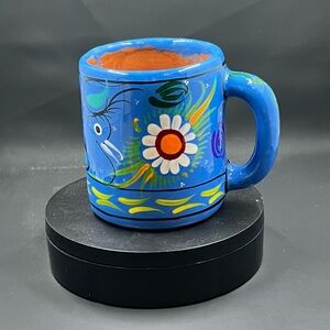 Handcrafted Blue Ceramic Mug with Floral Design